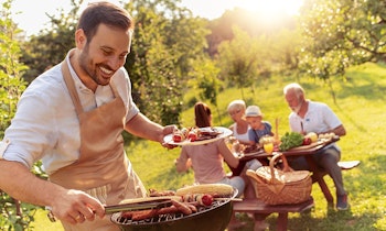 Image of a family enjoying a BBQ