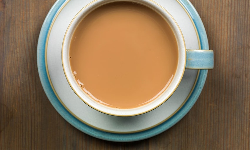 birds eye view of a nice strong english breakfast tea in a blue and white cup and saucer 