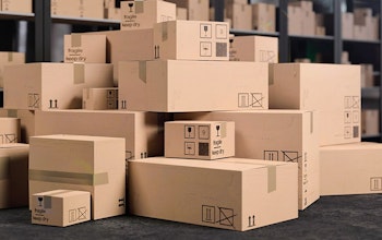 Stacked cardboard boxes in warehouse 