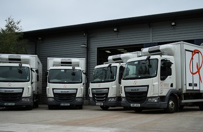 Q Catering Lorries Parked Up outside Warehouse 