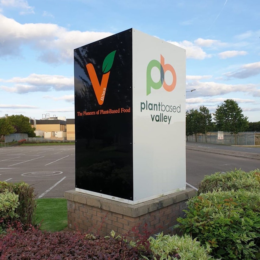 Plant Based Valley Statue Statue and brickwork with plant based valley logo in front of car park on site showcasing plant based valley as pioneers of plant based food in the north east