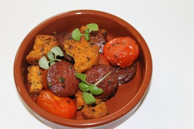 tapas dish filled with chorizo, tomato and chorizo, pepper and tomato biscotti 