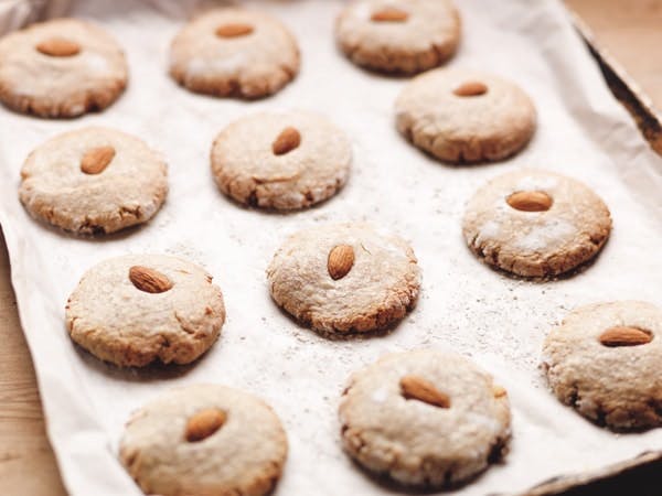 Honeybun’s Gluten-Free Amondi Cookies a tray of 12 honeybuns amondi cookies on baking paper ready to go into the oven
