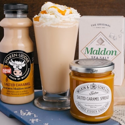 shaken udder salted caramel milkshake and wilkin and sons salted caramel spread next to a tall glass of salted caramel hot chocolate 