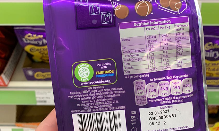 back packaging, ingredients lists and nutritional content of a pack of dairy milk buttons 