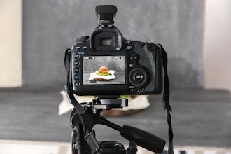 Image Capture Service a dslr camera on a tripod shooting a burger on a grey backdrop