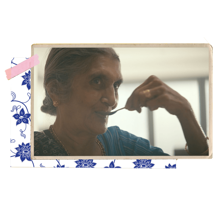 Manufacturer Up Close: Tilda Rice lady eating a spoonful of tilda rice