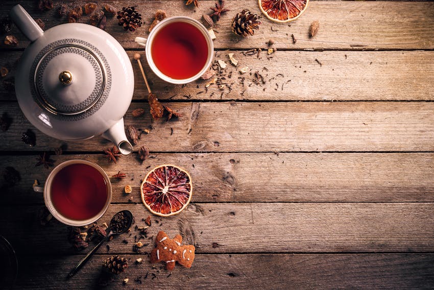 A tea pot and cups of black tea, one of the world's most famous teas