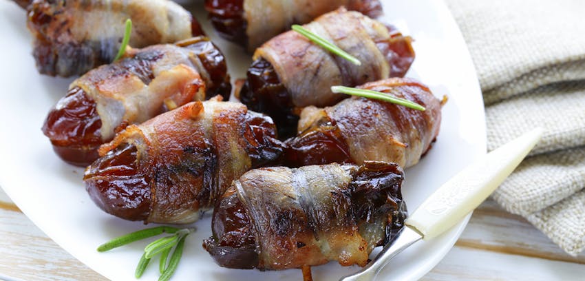 Easy canapes - bacon wrapped dates