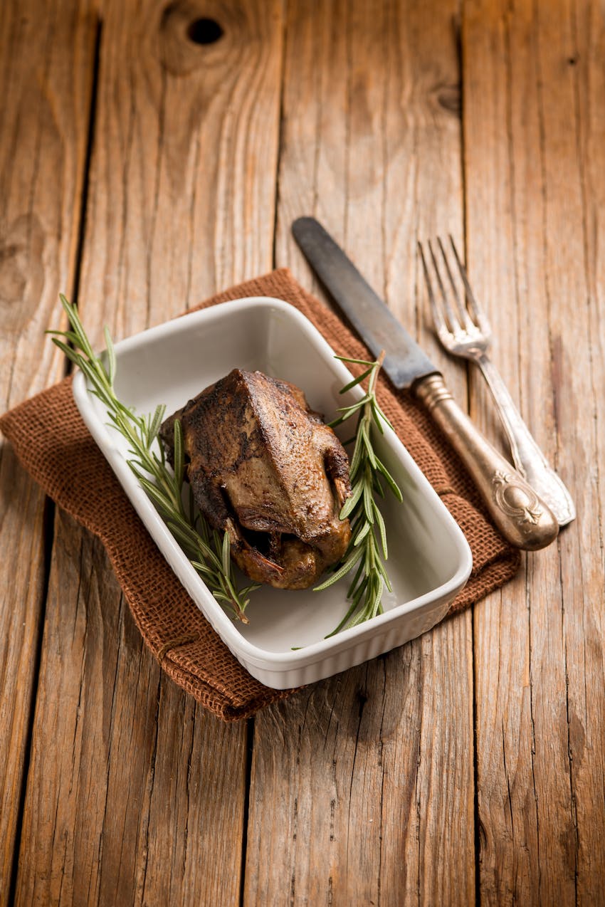 Summer seasonal foods in the UK  - roasted wood pigeon