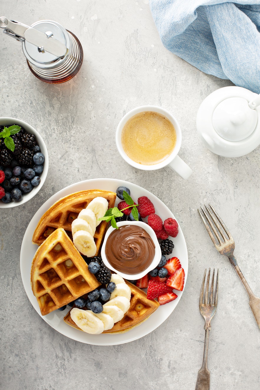 What can I put on my waffles? Nutella. berries and banana on waffles What can I put on my waffles? Nutella. berries and banana on waffles