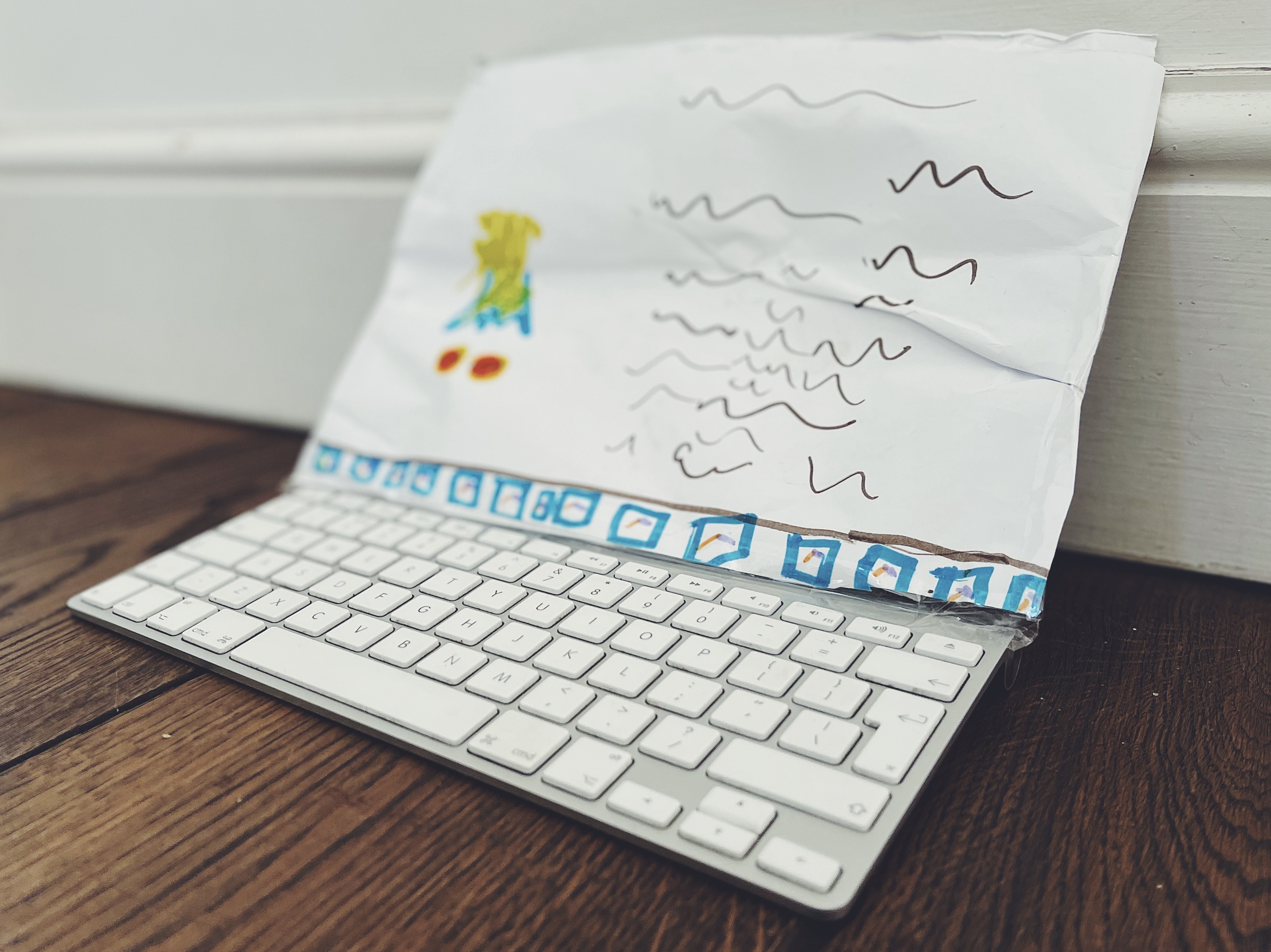 A child's drawing of a calendar against a skirting board