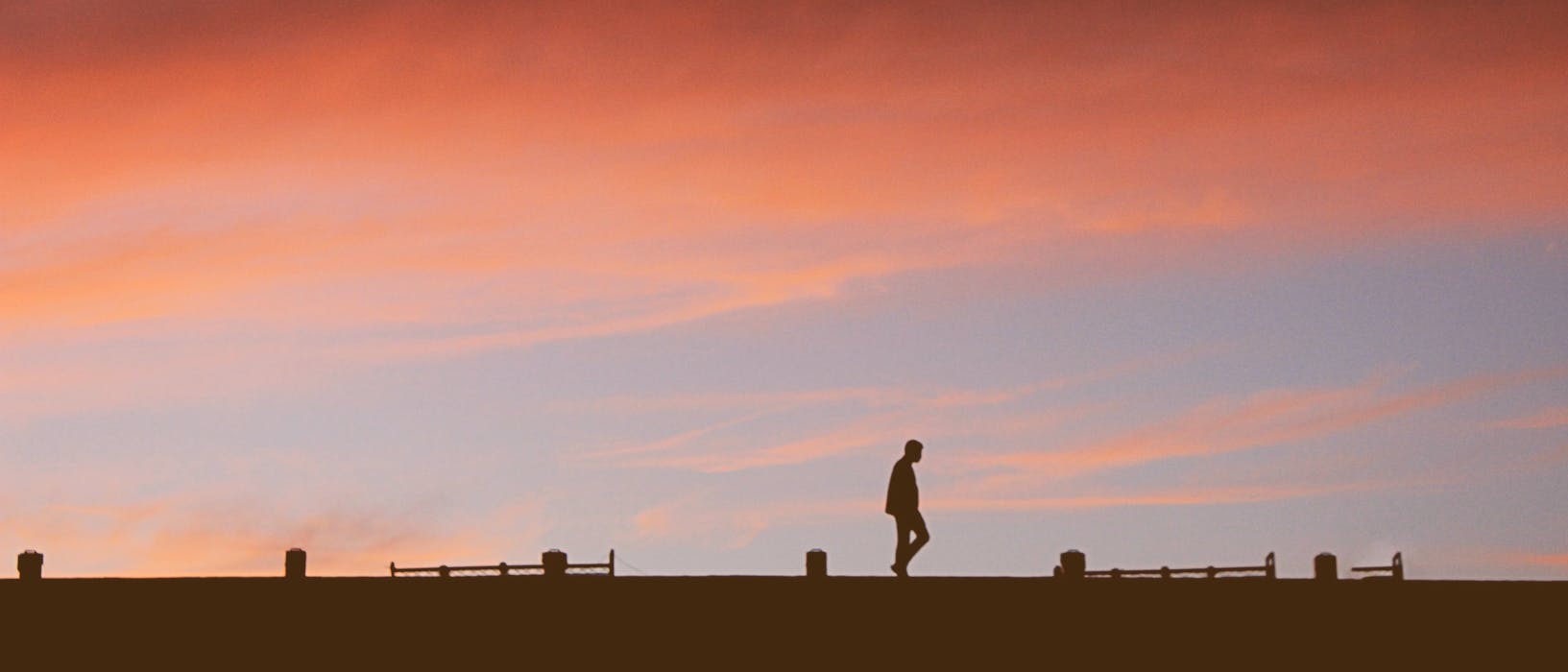 silhouette of man at golden hour