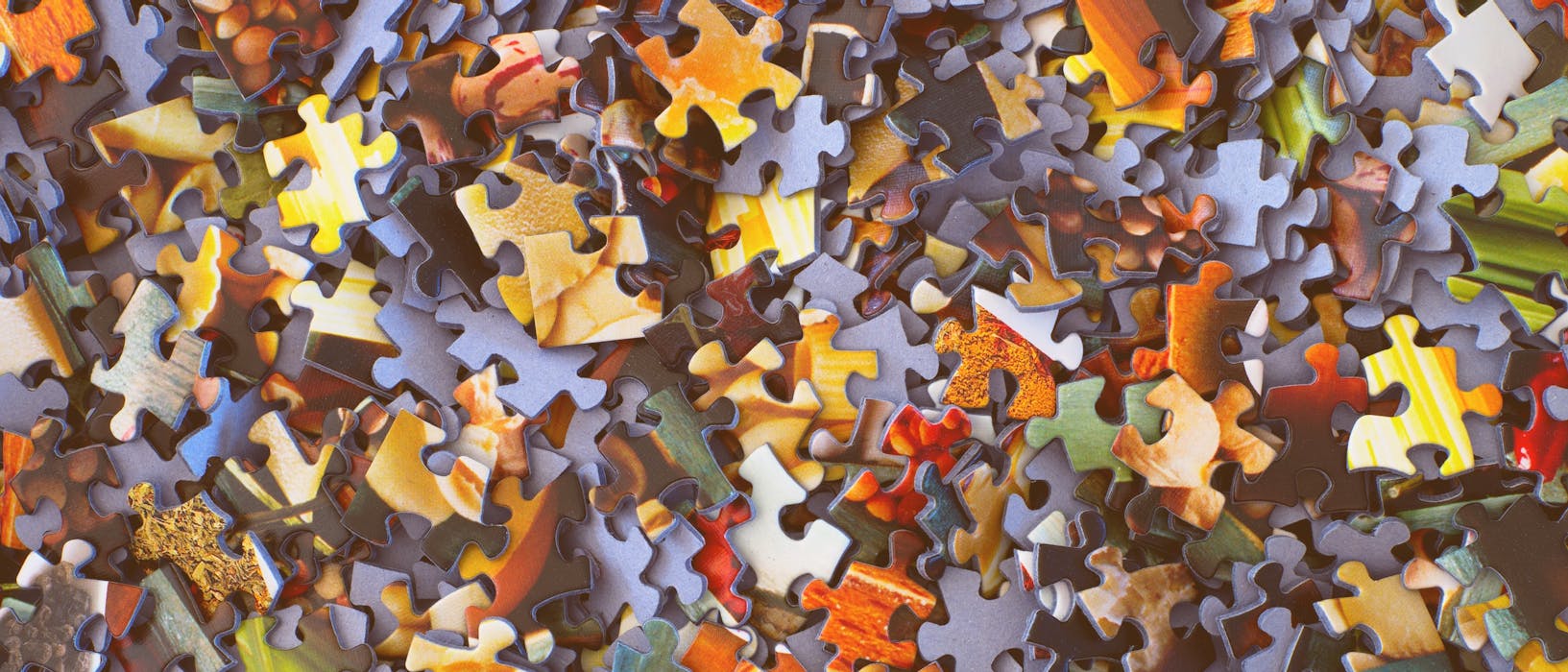 stack of jigsaw puzzle pieces
