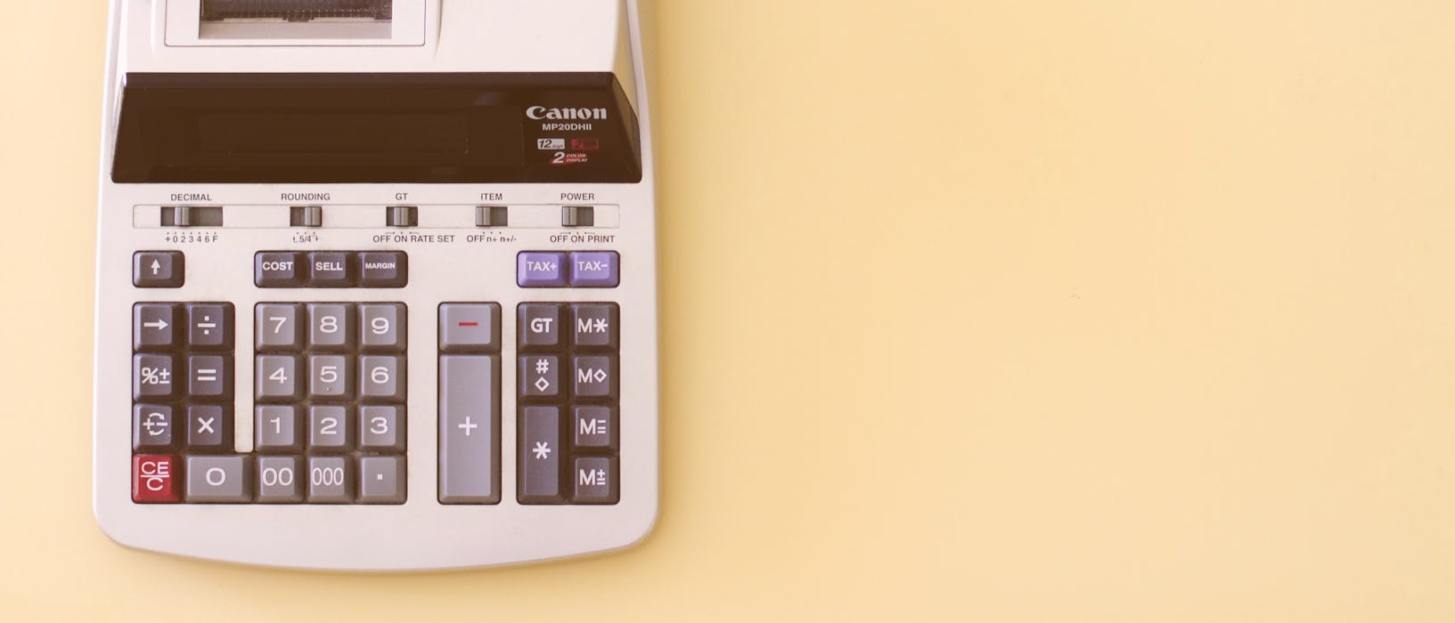 white Canon cash register