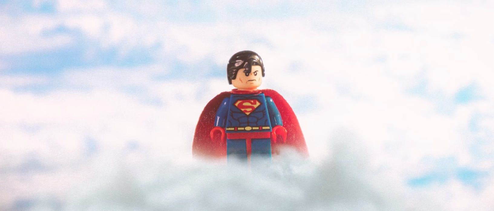 blue orange green and yellow plastic toy