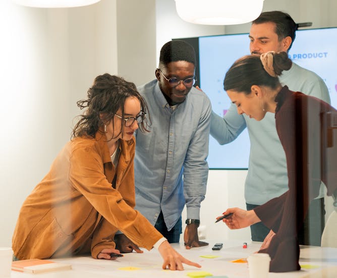 A group of co-workers in a planning session
