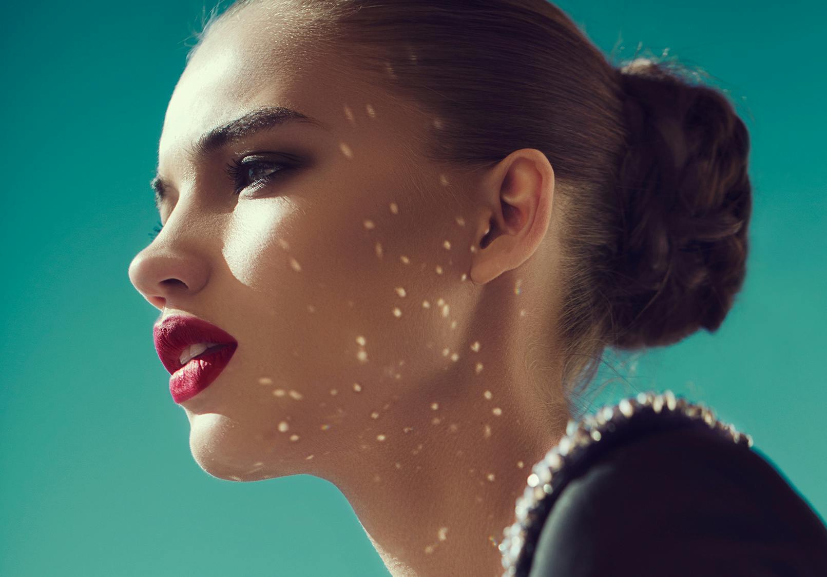 Profile of enchanting woman with a gorgeous nose.