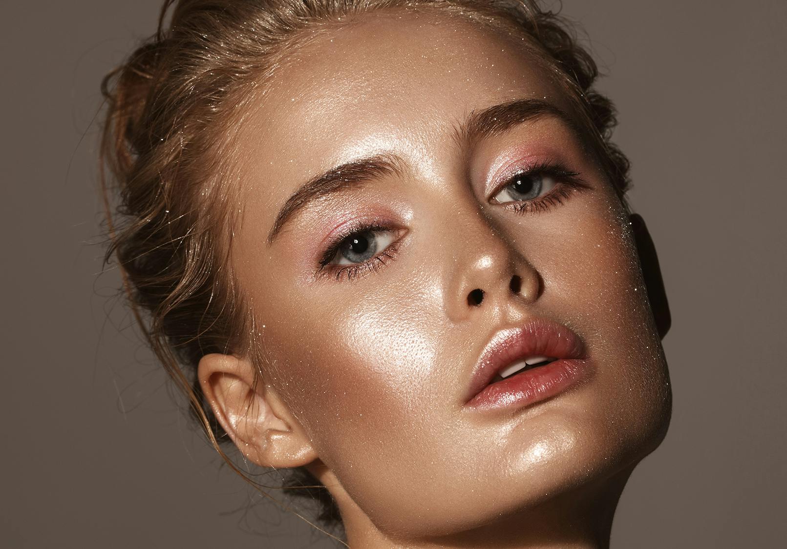 Close up on woman's smooth and glowing skin.