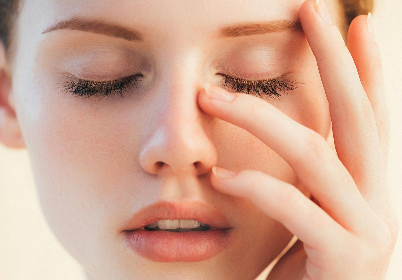 Close up on beautiful woman with lush eyelashes.