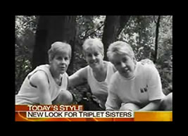 Three People Posing Togher in a Black and White Photo