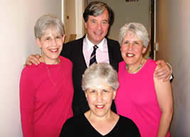 Dr. Antell Posing with Three Women