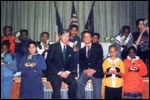 Dr. Antell Sitting with a Group of People