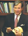 Dr. Antell in Front of a Bookshelf