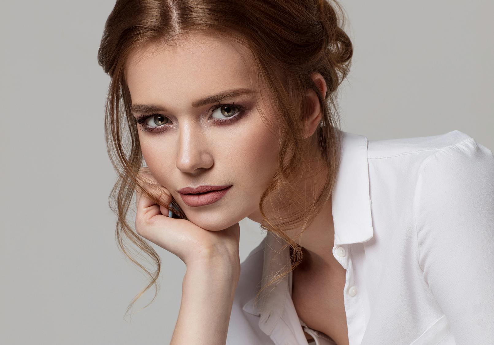 Gorgeous woman with a delicate face and smooth skin.