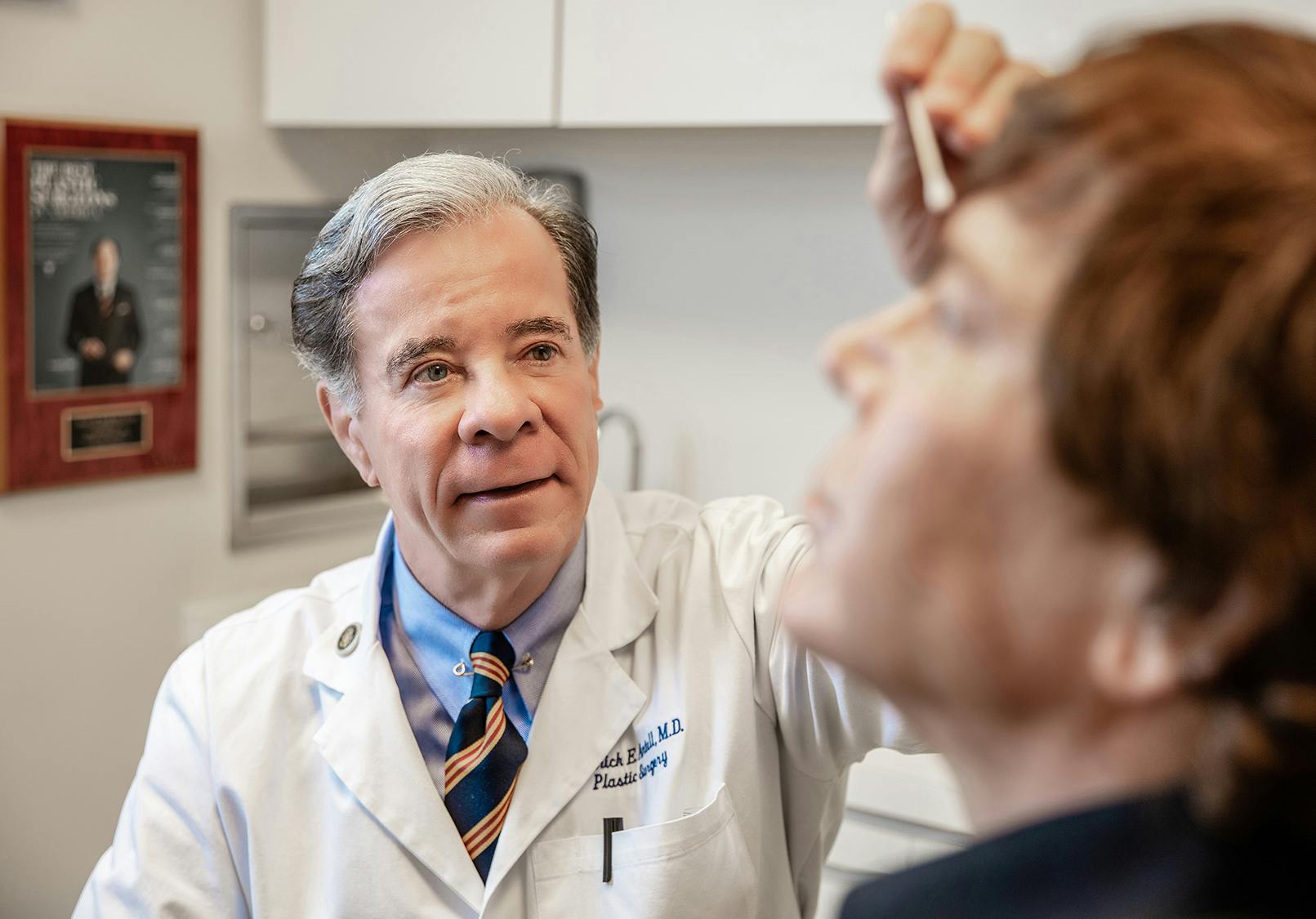 Dr. Antell works with a patient.