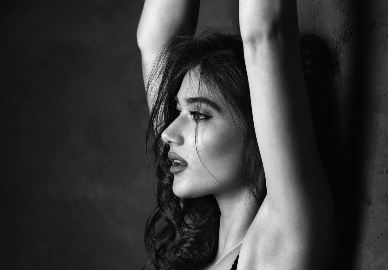 Attractive woman with gracefully slim arms.