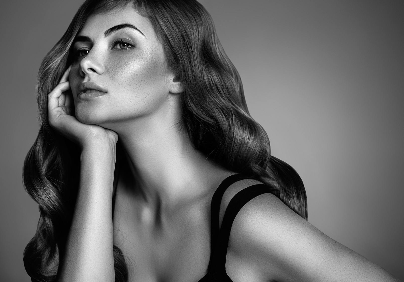 Stunning woman with long slender neck.