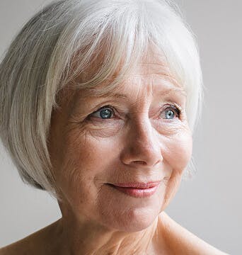 older woman with short grey hair