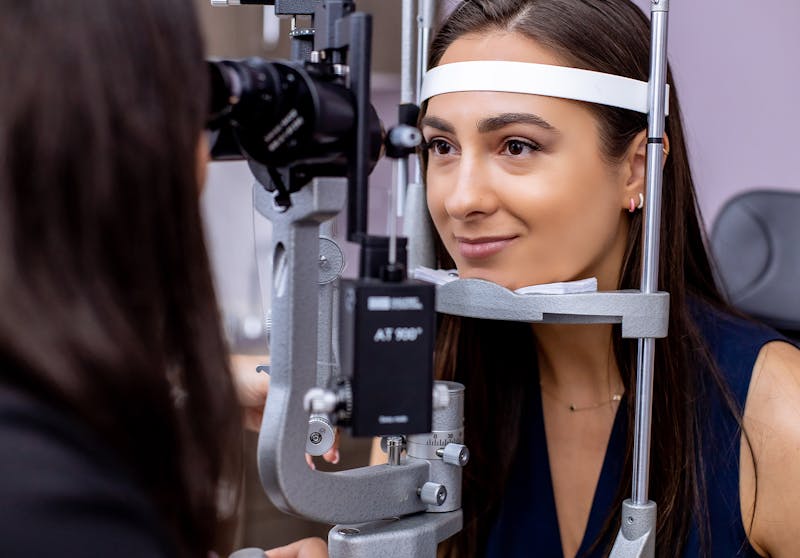 woman getting her eyes examined