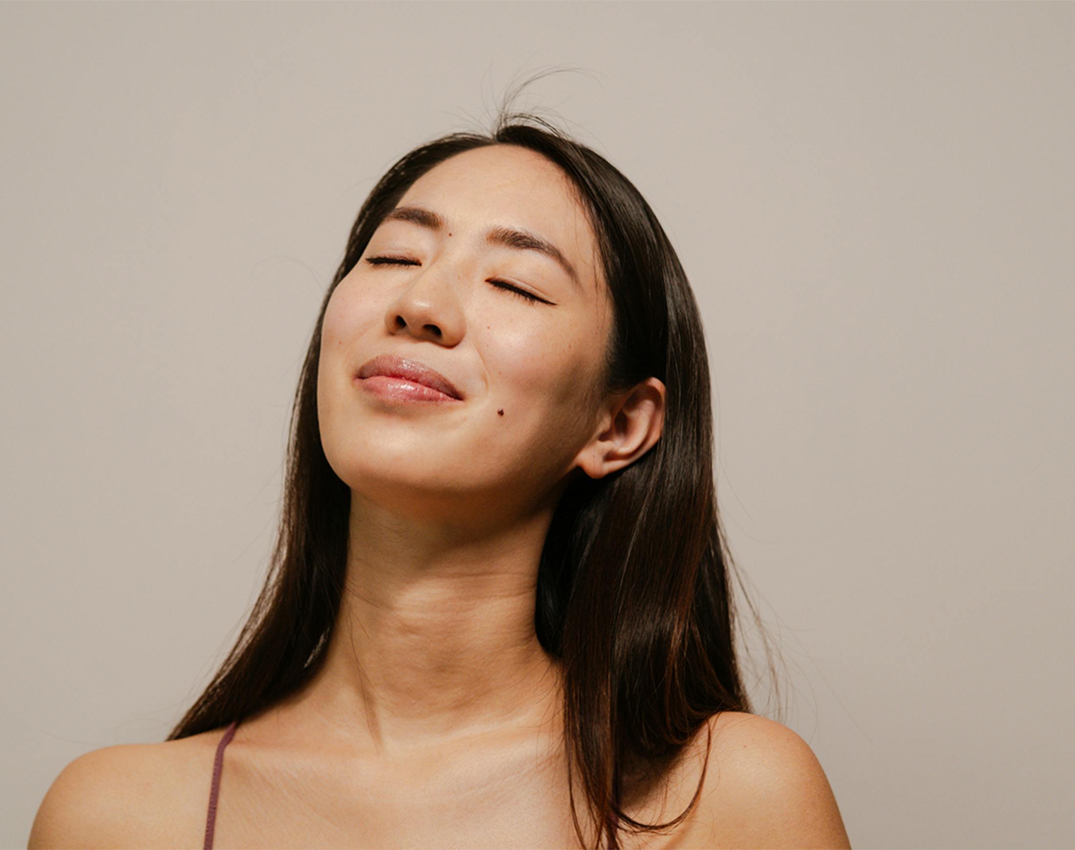 woman closing her eyes