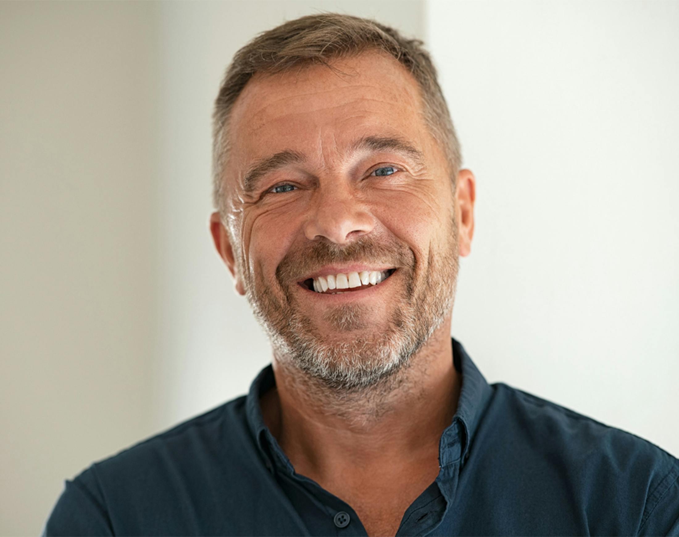 older man smiling