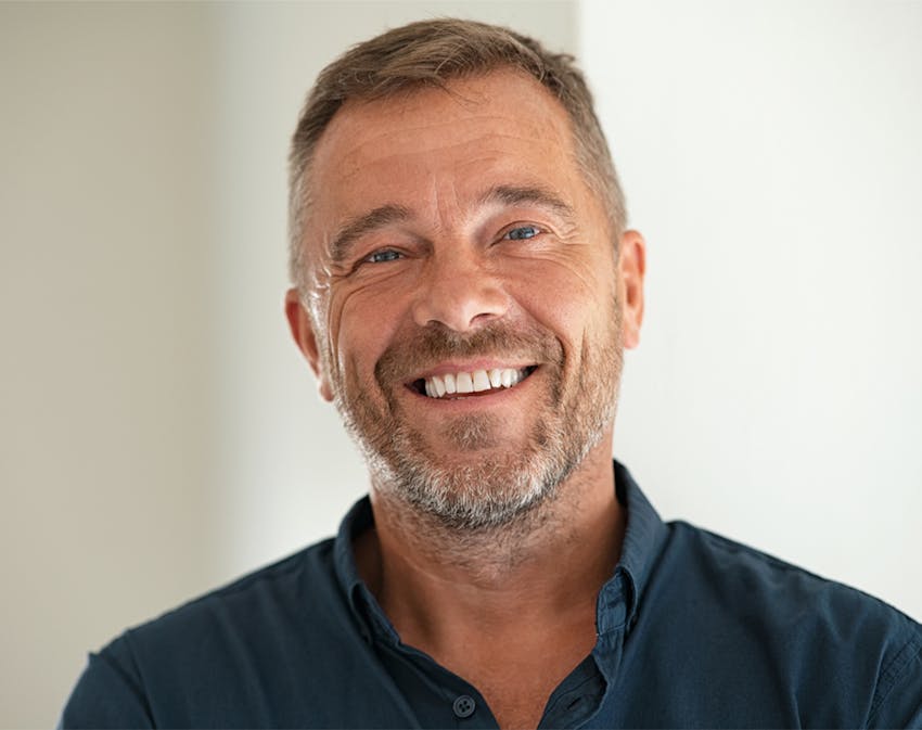 older man smiling