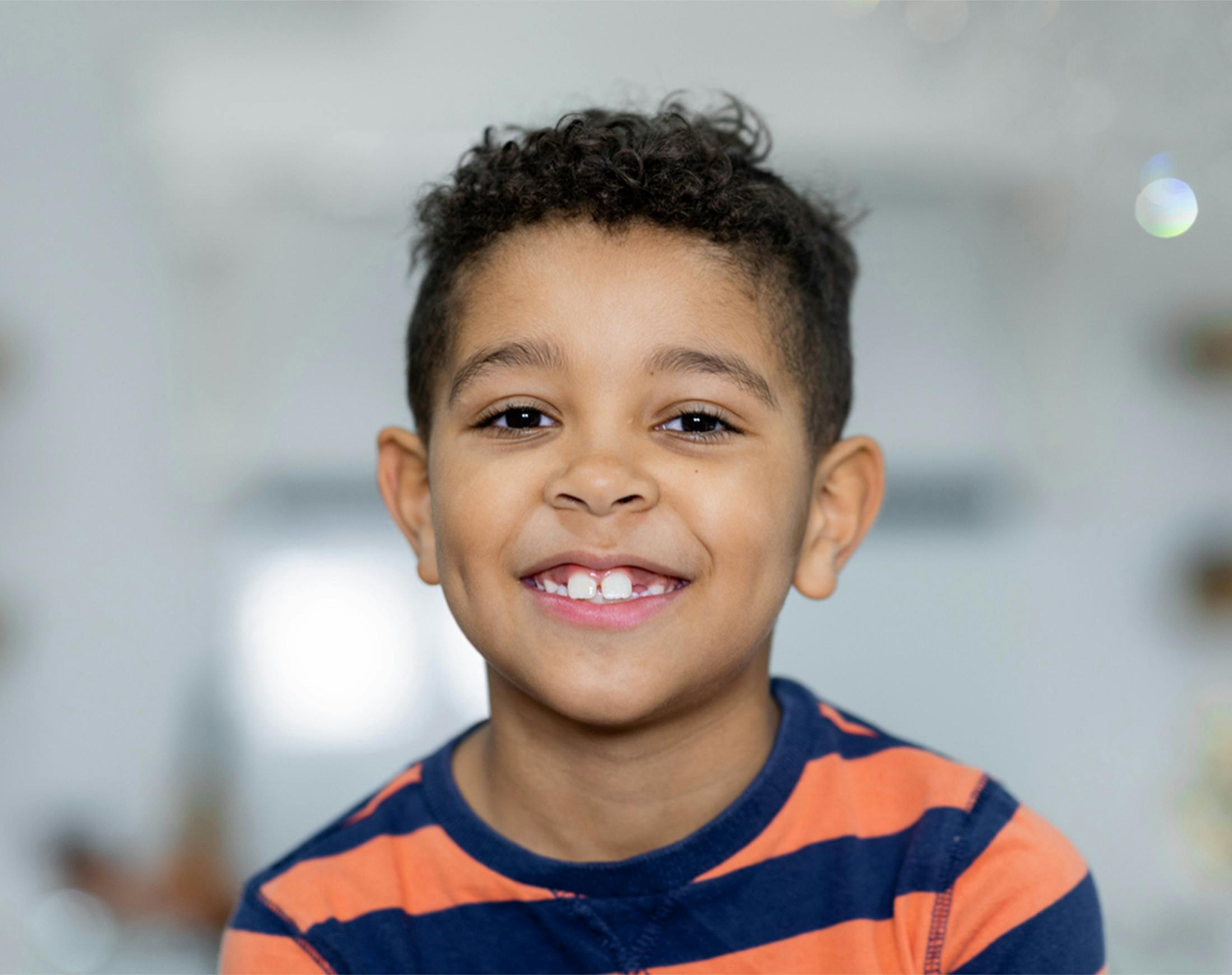young boy smiling
