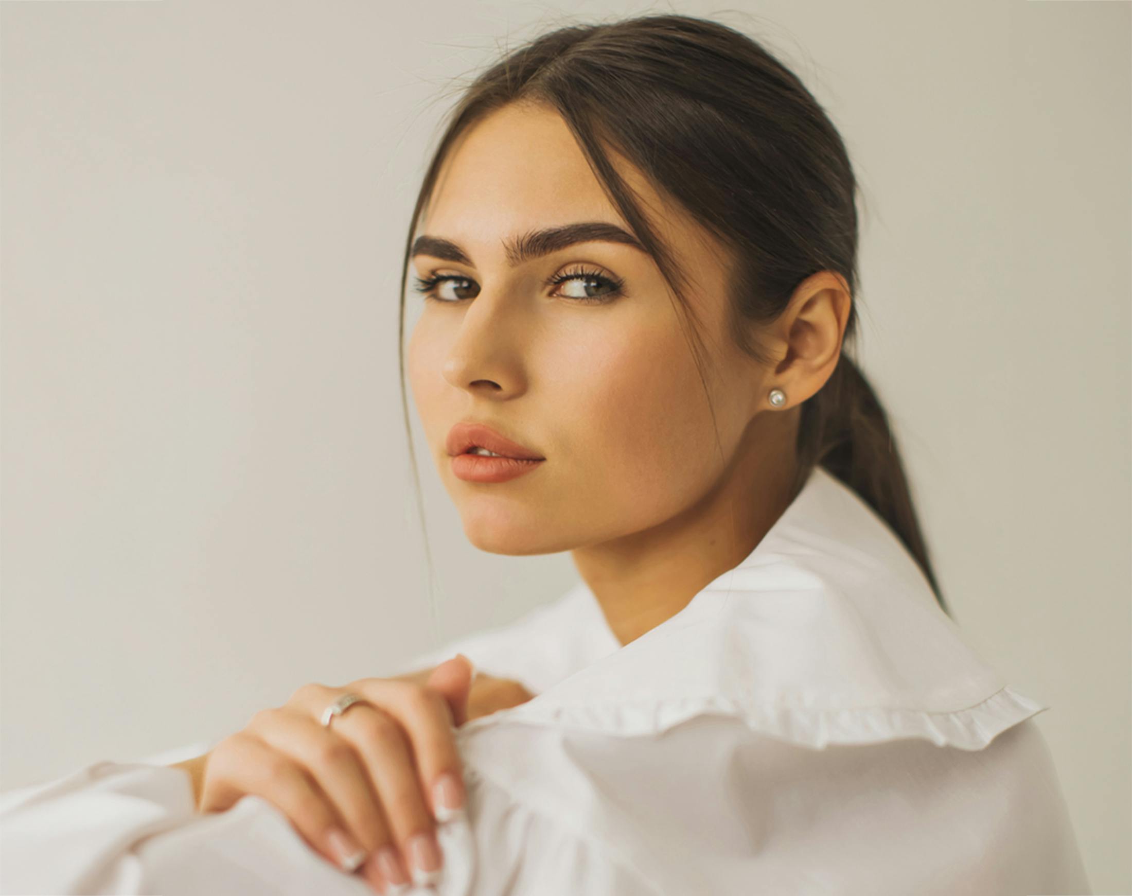 woman looking over her shoulder