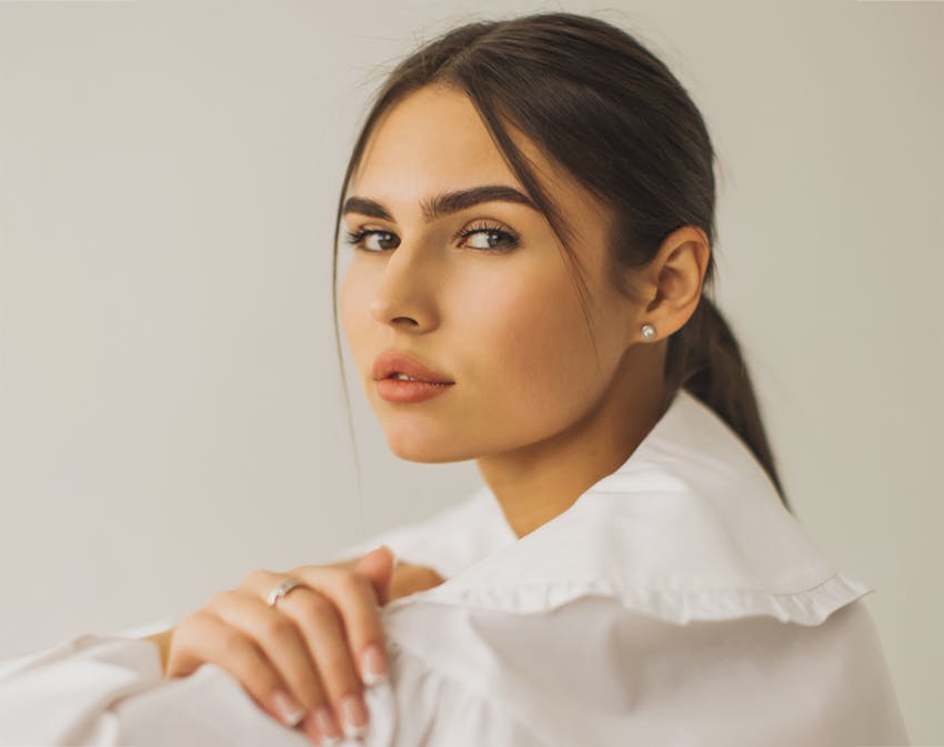 woman looking over her shoulder