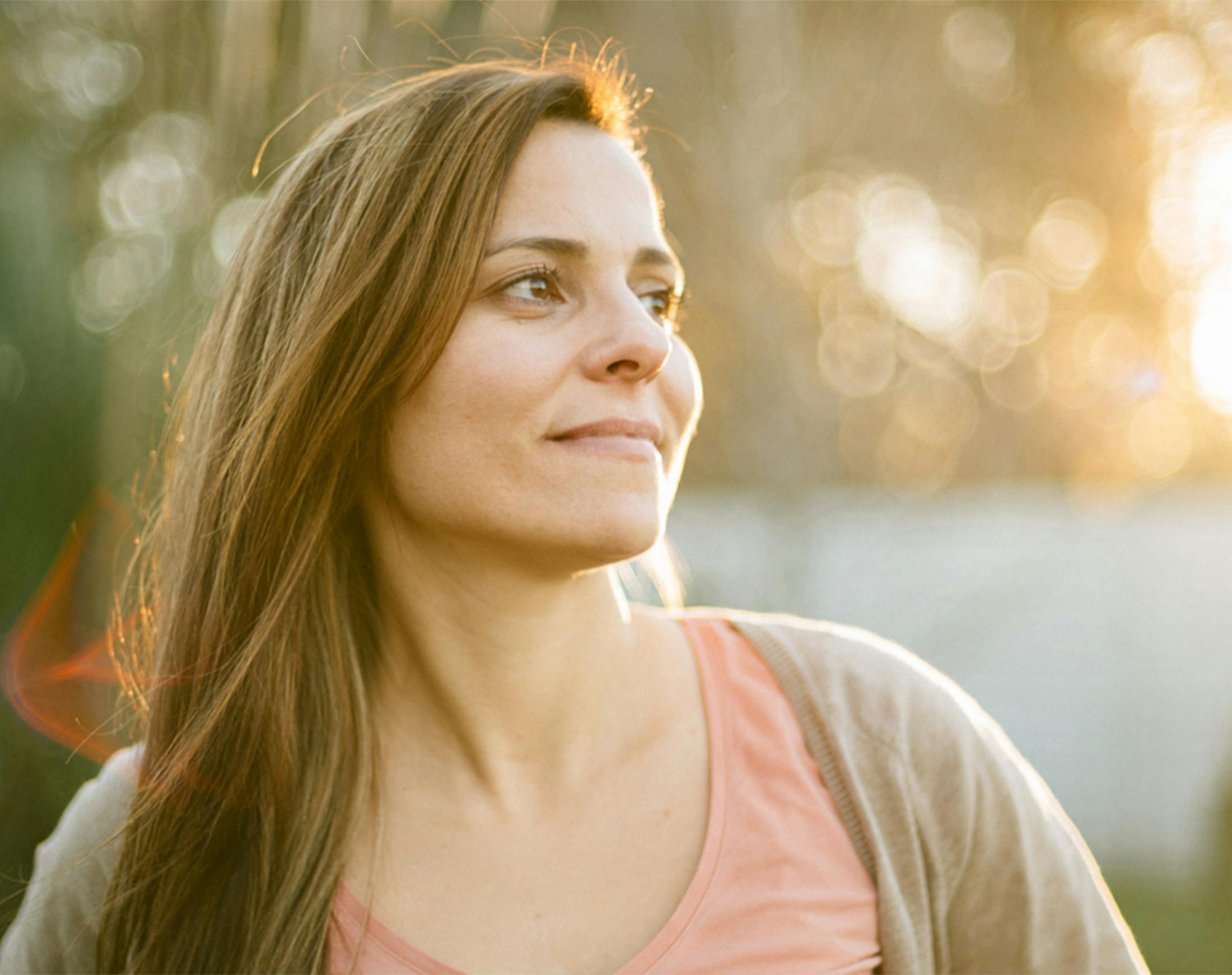 woman smiling to the side
