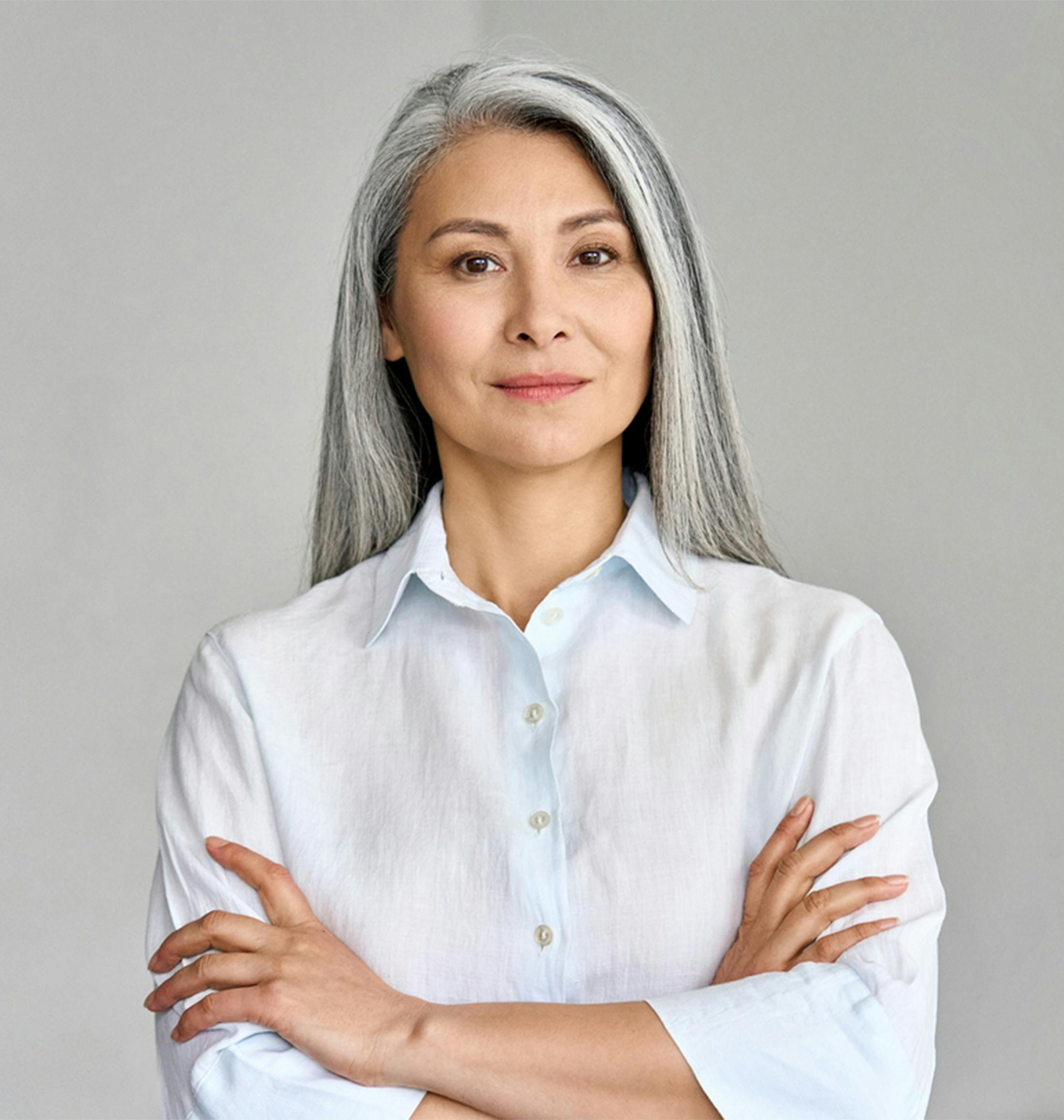 older man crossing her arms