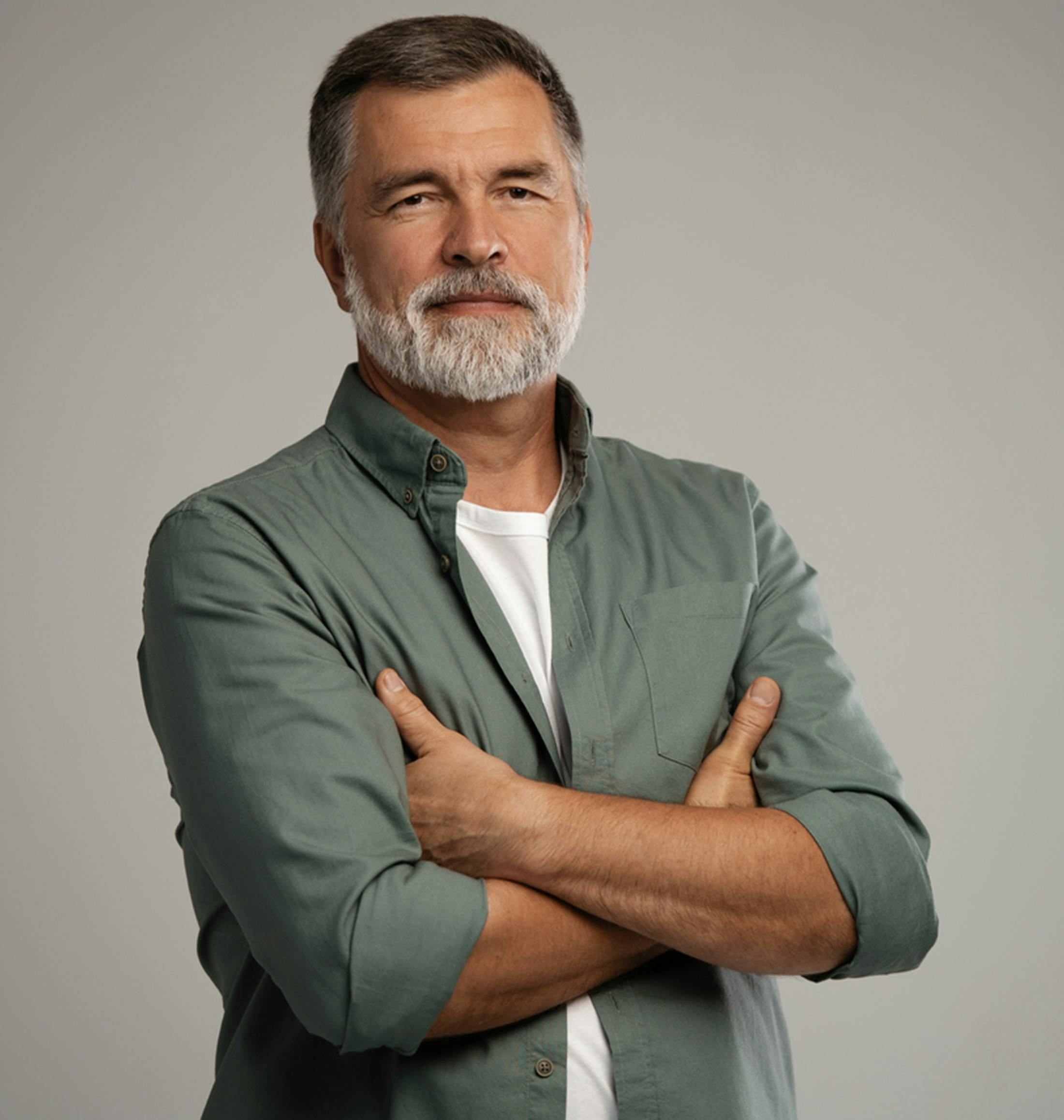 older man crossing his arms