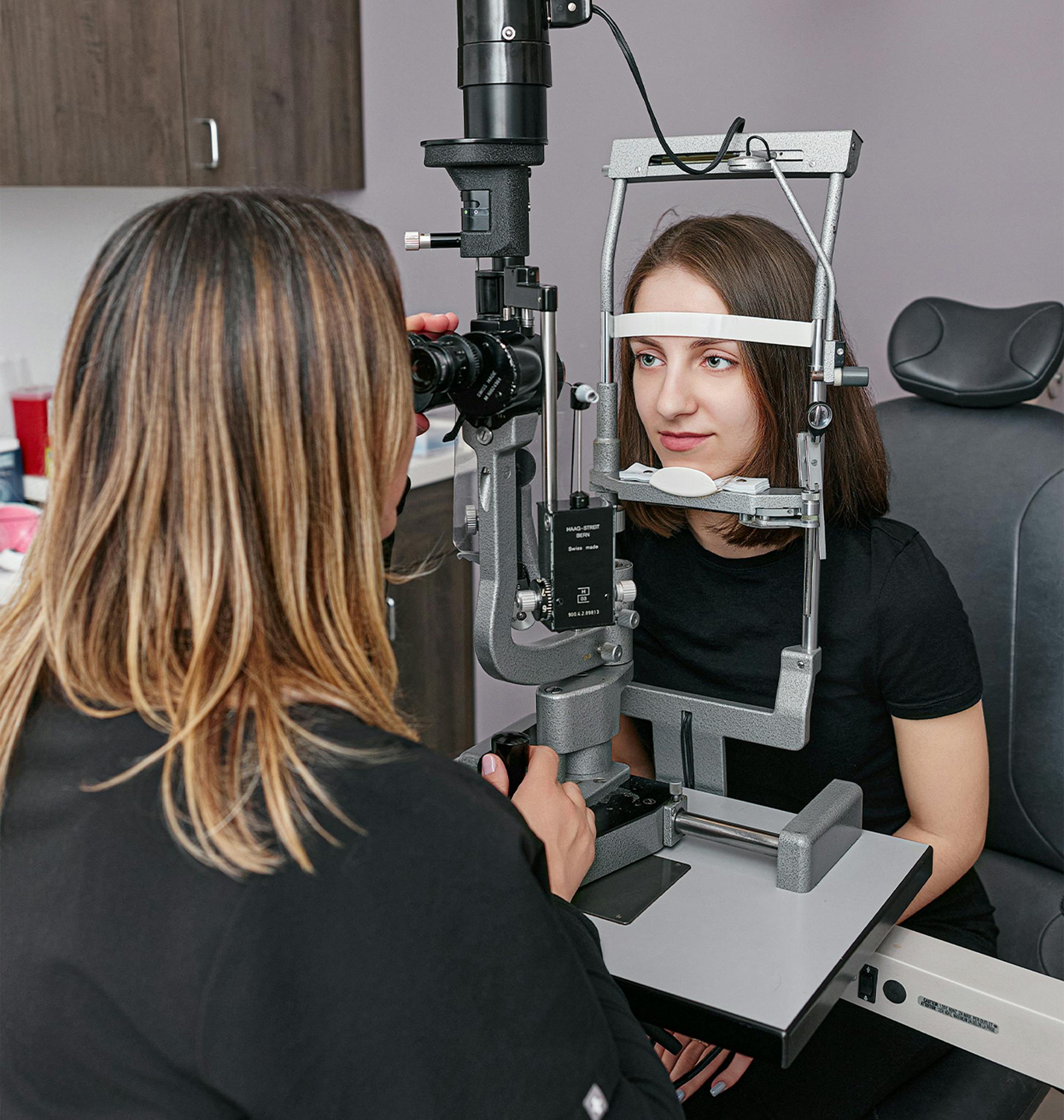 woman getting her eyes examined