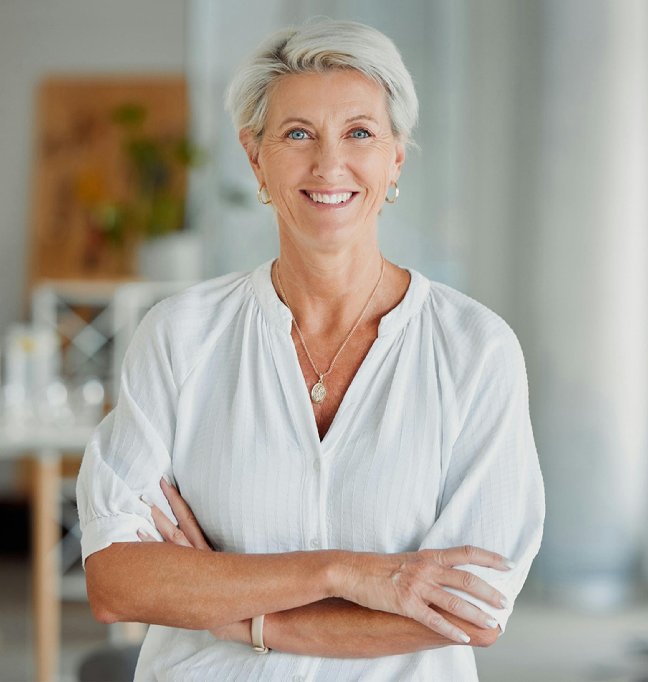 older woman crossing her arms