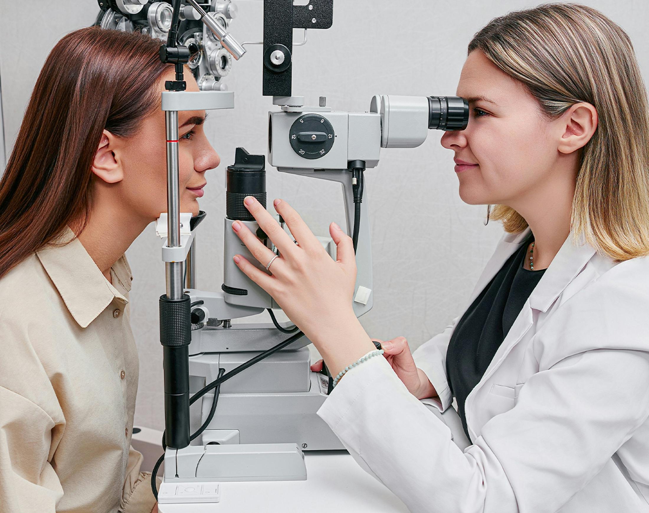 doctor examining a patients eyes