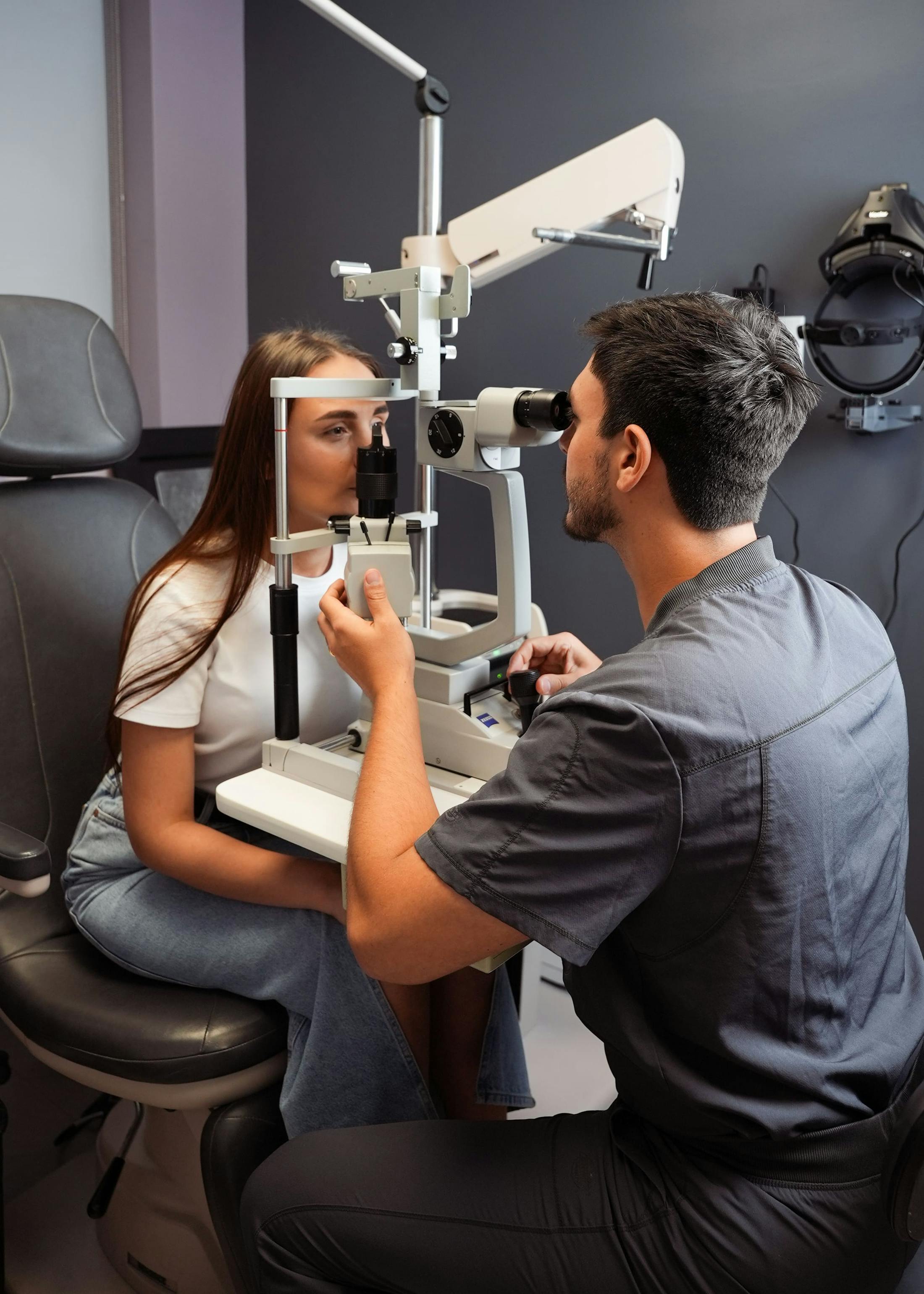 Dr. Wilneff Giving an Eye Exam