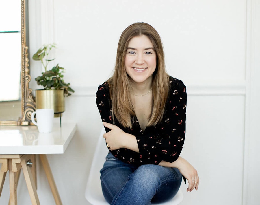 Megan Tantillo, sitting and smiling