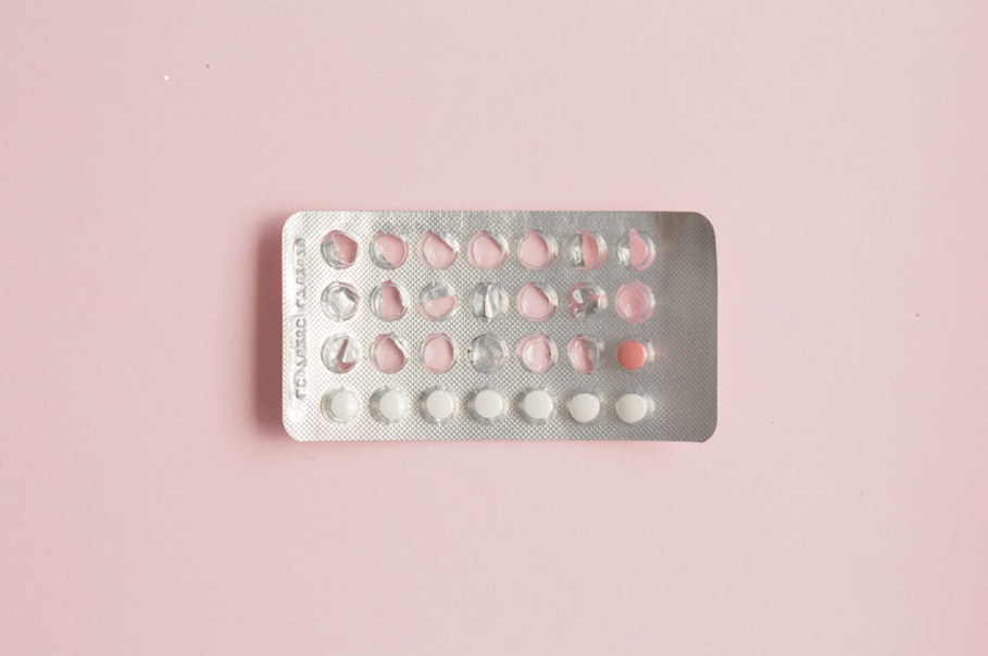 Photograph of a packet of birth control pills with only a few pills left in the packet