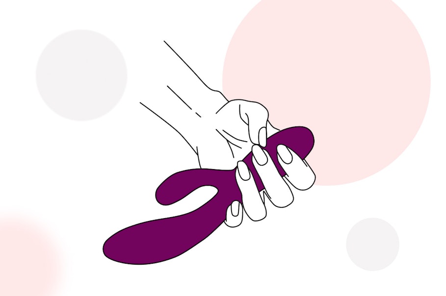 Illustration of hand holding a sex toy toy